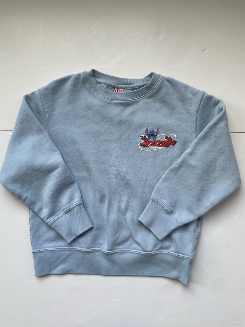 2/$30 - Uniqlo girls Stitch crewneck - size 7/8